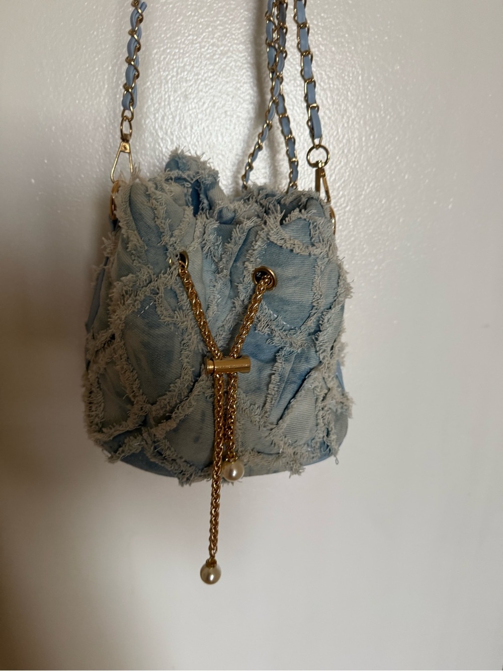 Brand new-Frayed Denim Bucket Bag with Gold Chain Accent